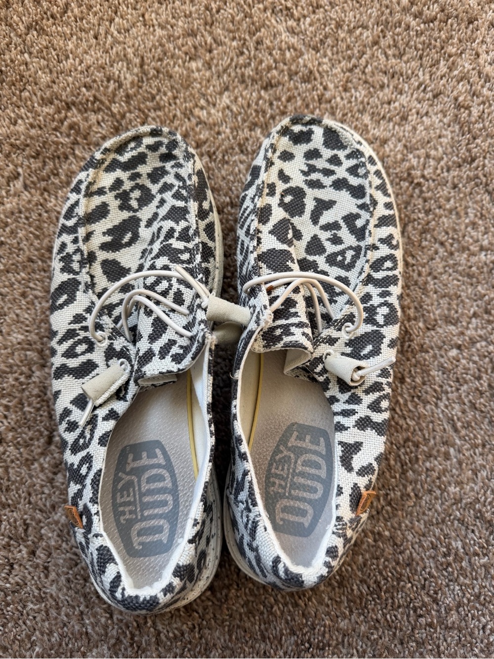 Hey Dude Leopard Print Slip-Ons in Black and White